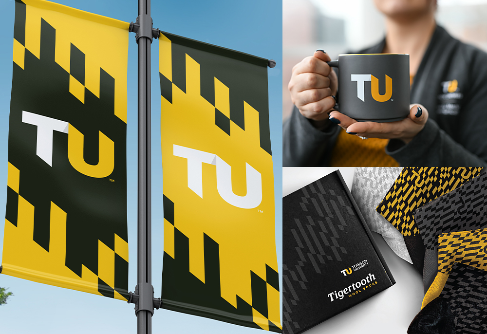 yellow and black branded TU banners, a coffee cup and other TU branded promotional items