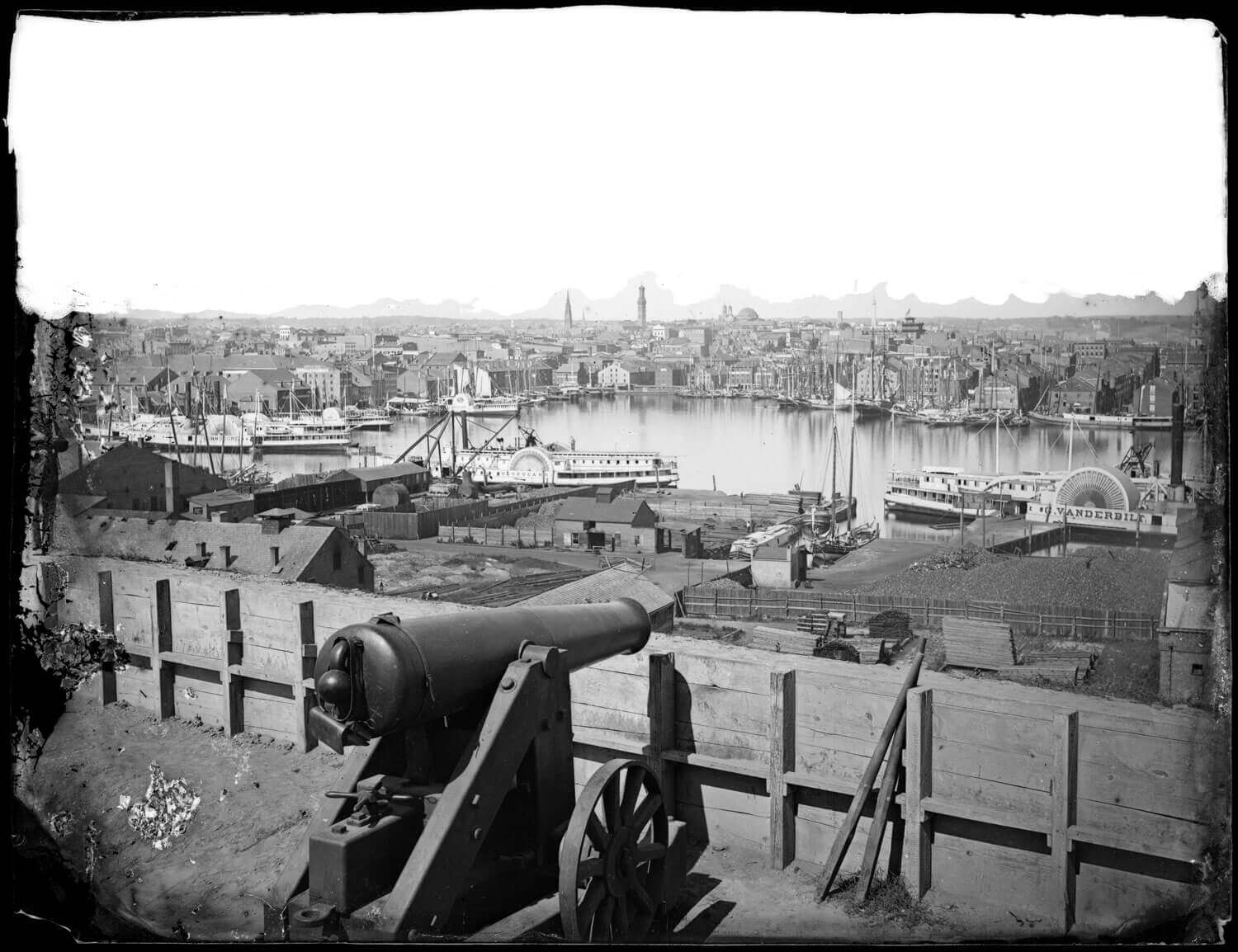 An image of Baltimore City with a cannon in the foreground from MCHC’s collection.