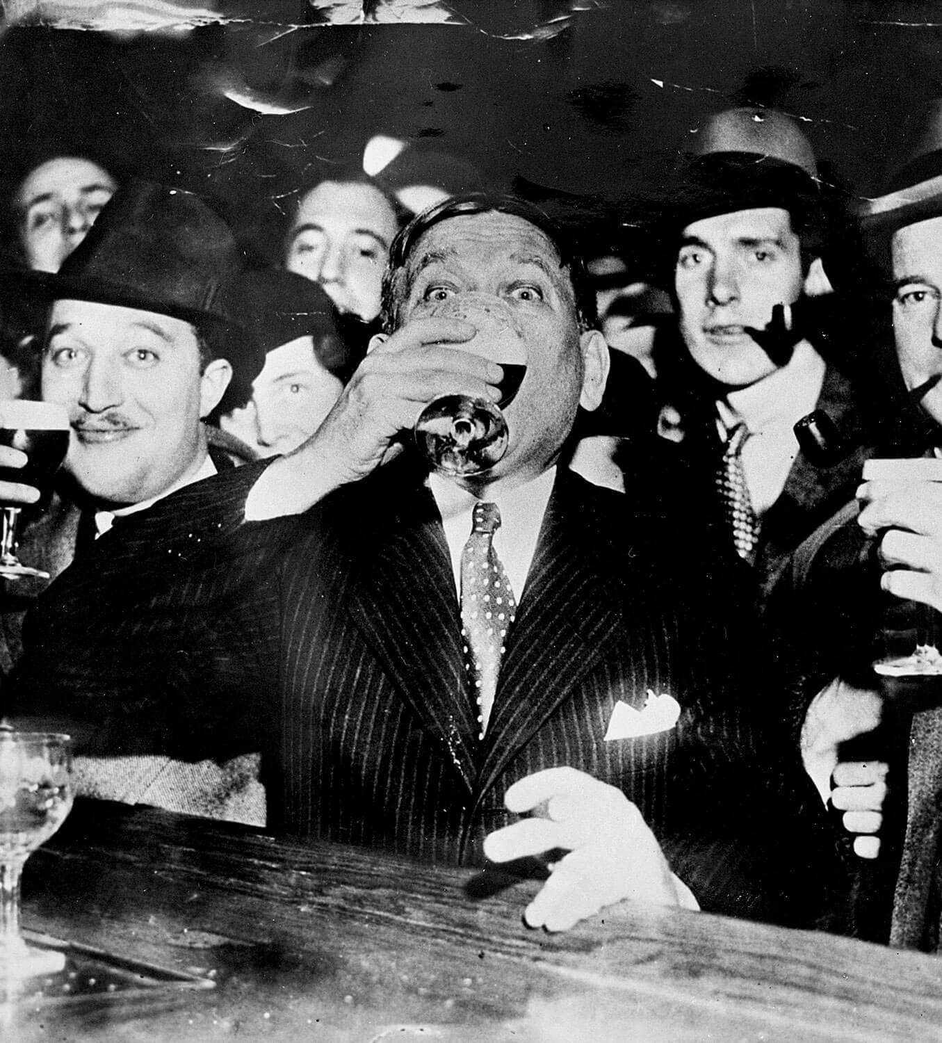 An image of a man drinking beer from MCHC’s collection.
