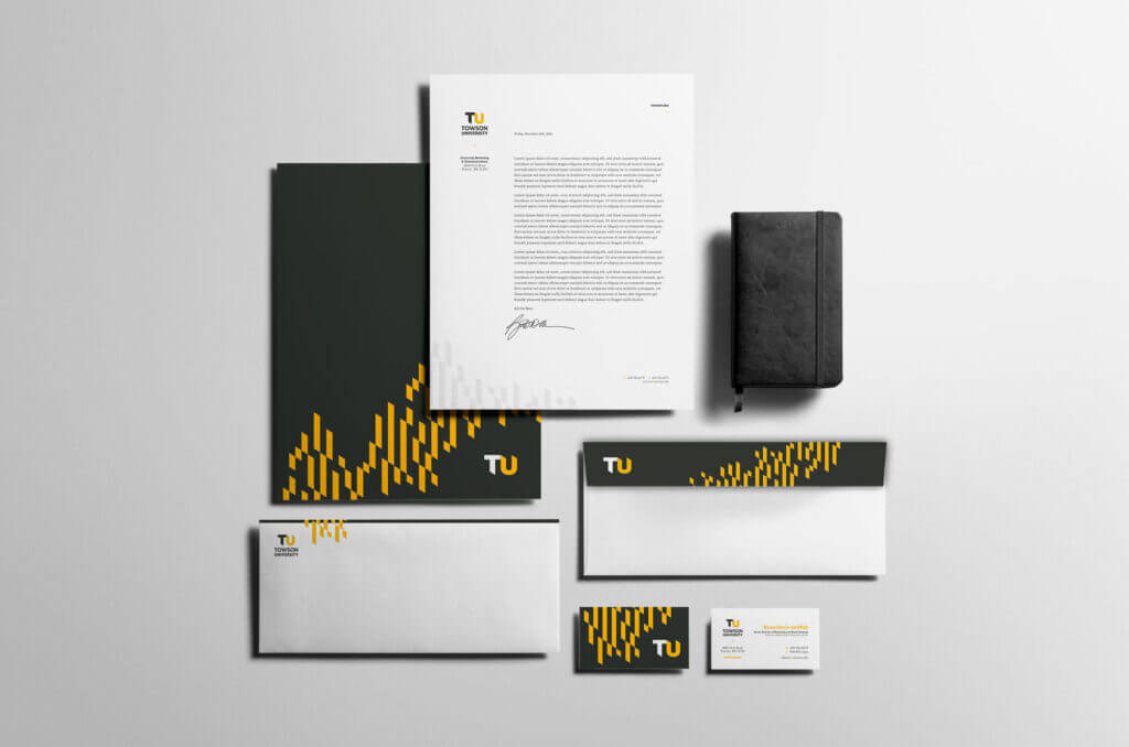 A suite of TU-branded stationery.