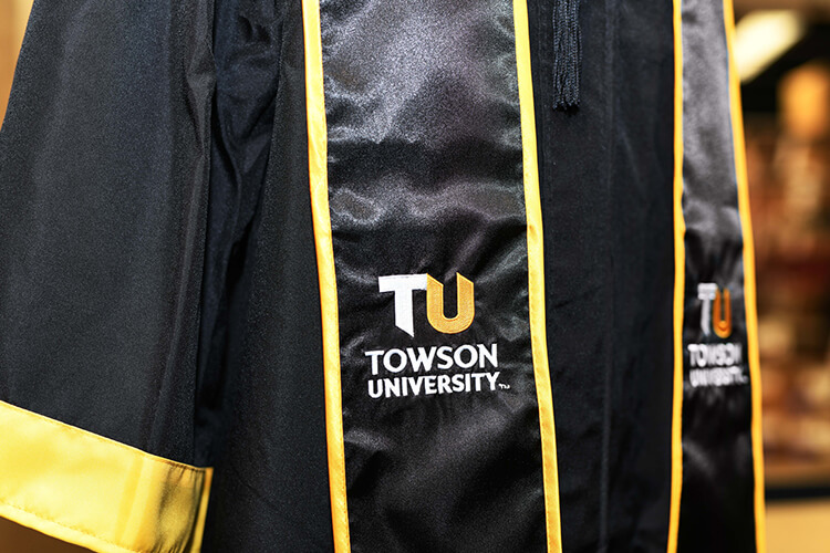 The TU logo on a graduation stole.