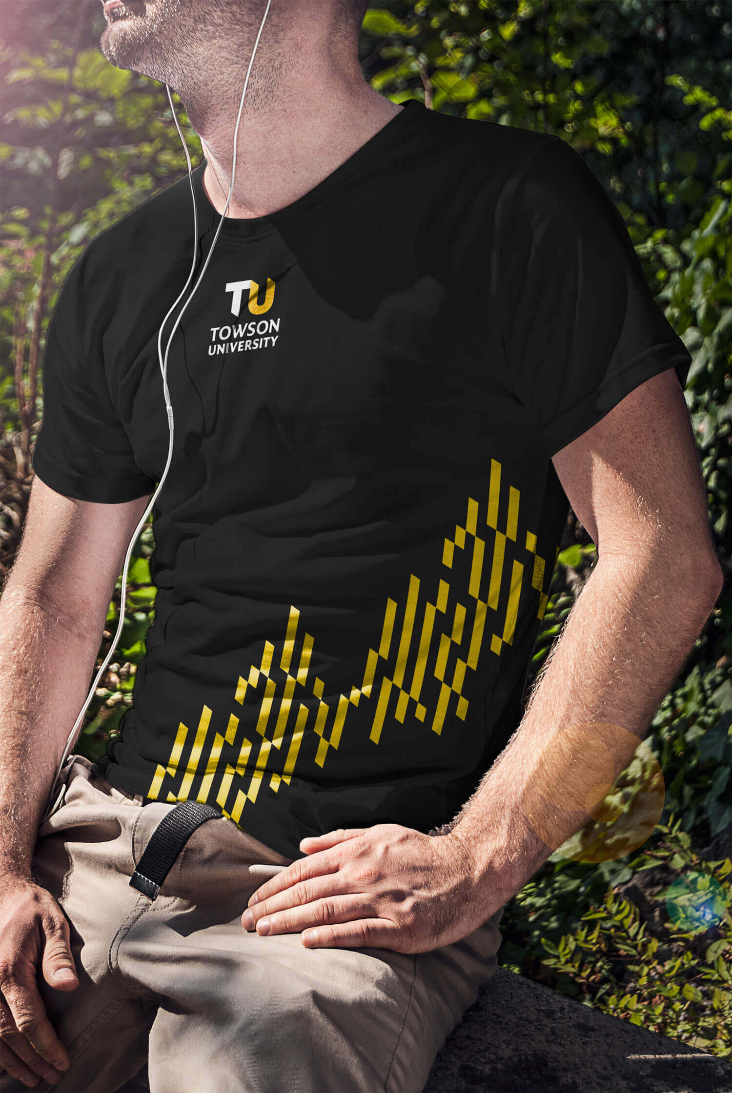 A black t-shirt featuring TU brand graphics.