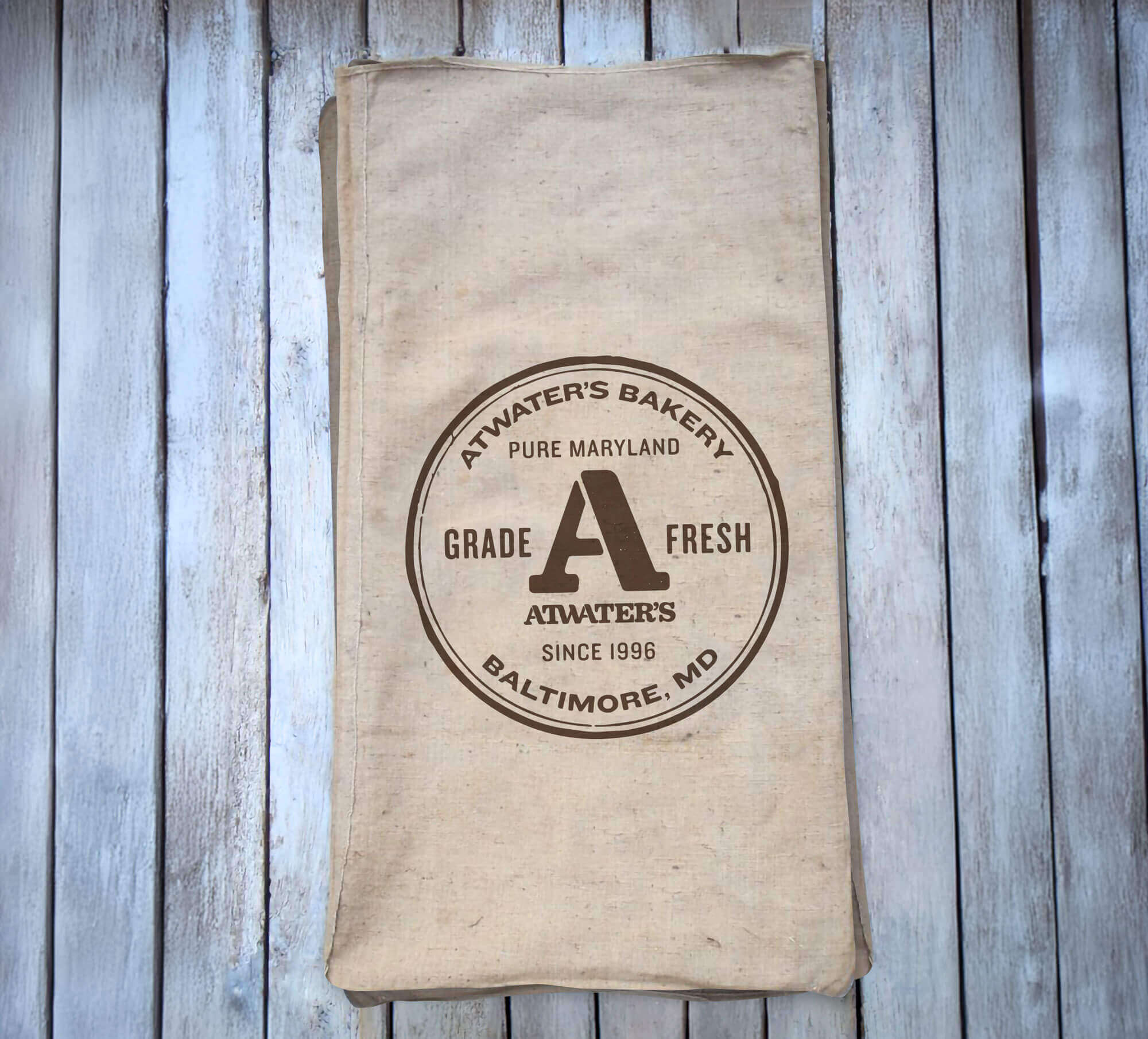Folded paper napkin with Atwater’s branding