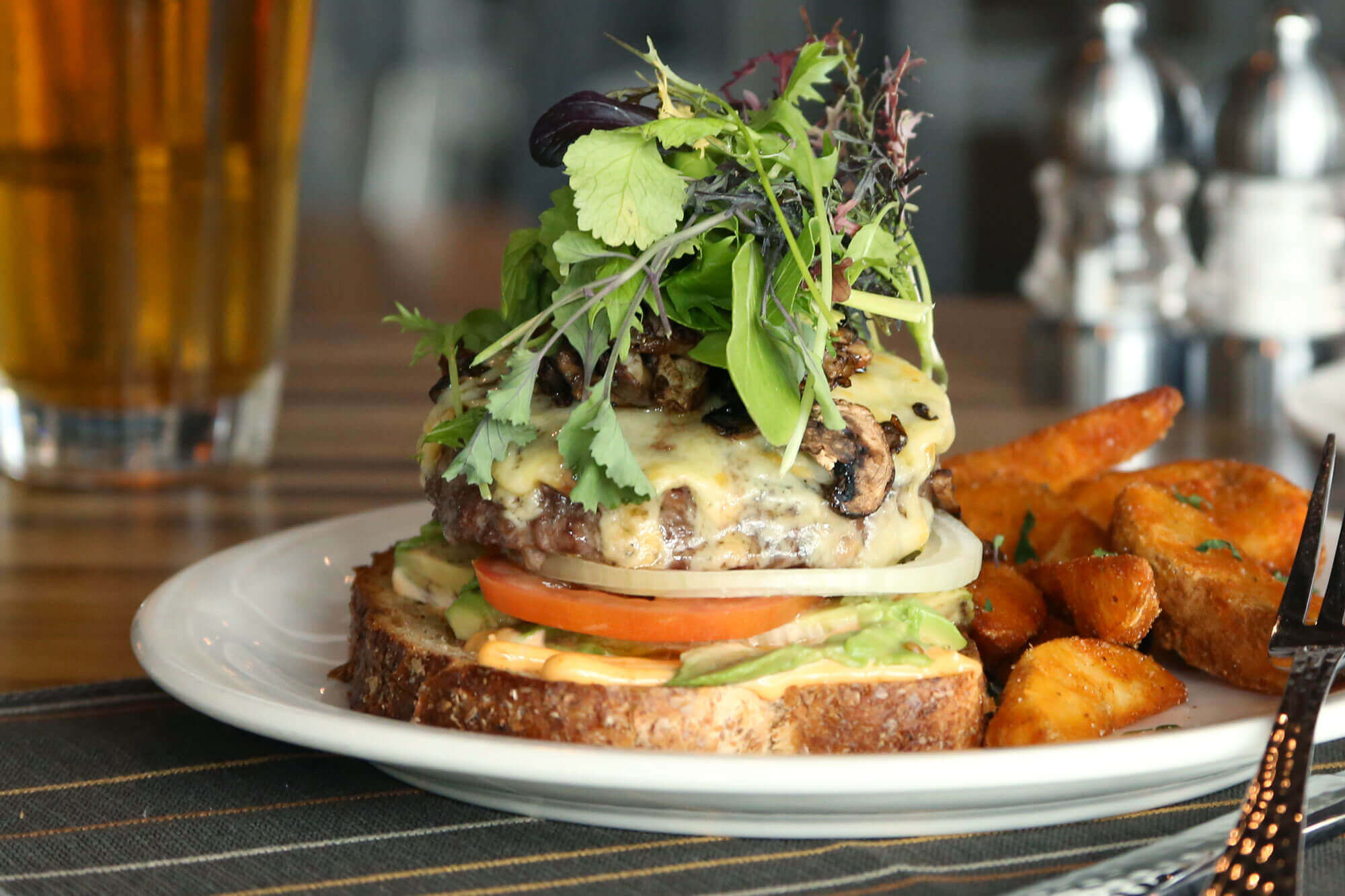 Close-up of a cheeseburger from a resort restaurant.