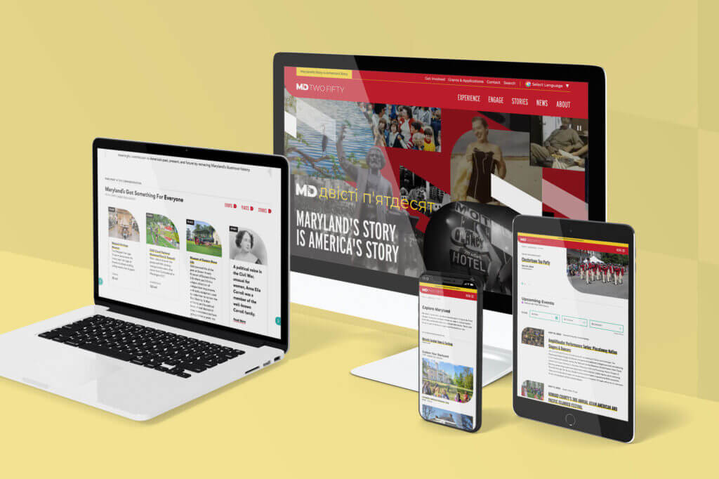 The MD TWO FIFTY website displayed on a series of screens, including a laptop, desktop monitor, tablet, and phone.
