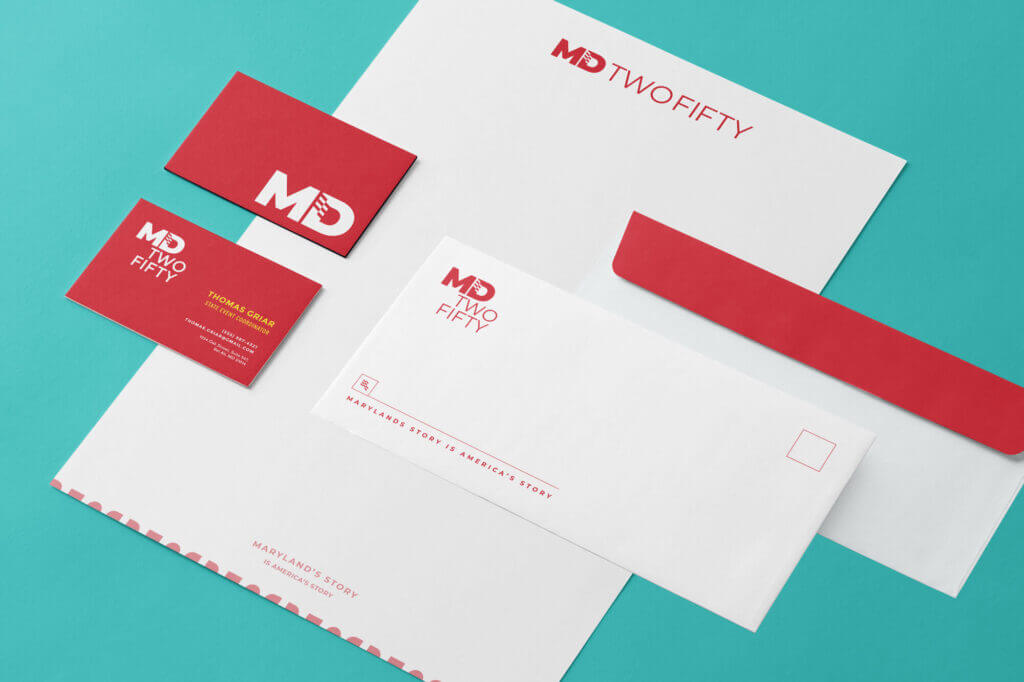 Business cards and stationery bearing the MD TWO FIFTY brand identity.