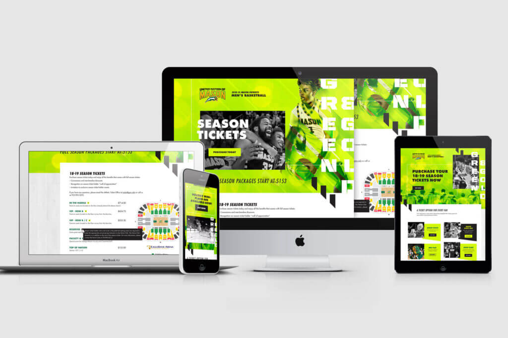 The GMU men’s basketball website displayed on a series of screens, including a laptop, desktop monitor, tablet, and phone.