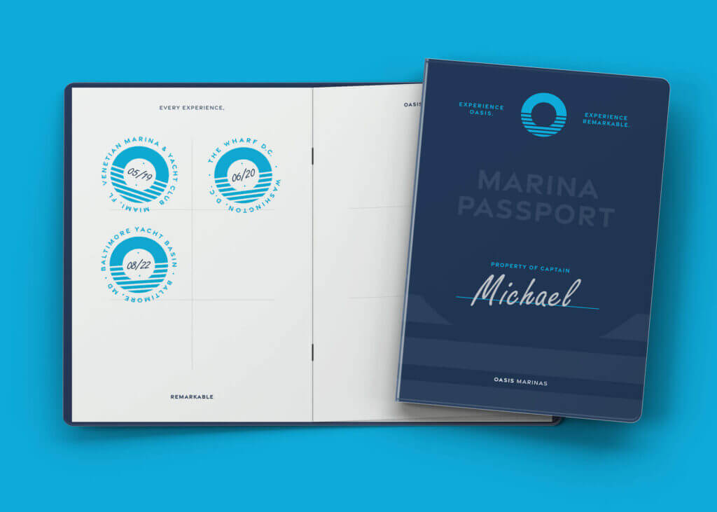 A mocked-up image of a marina passport concept featuring brand messaging and a series of rubber stamped oasis marinas logos.
