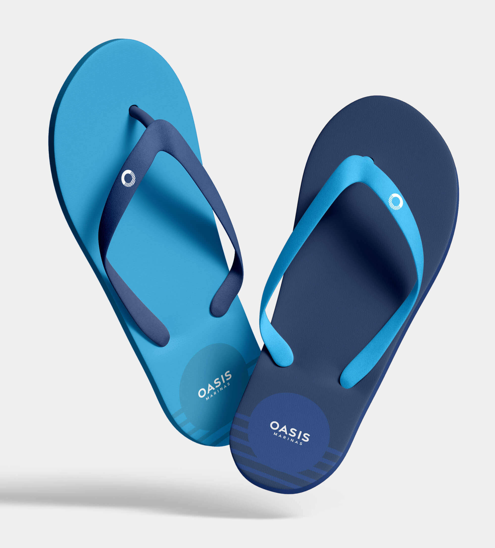 A mocked-up pair of flip flop sandals with the Oasis Marina logo on the heel.