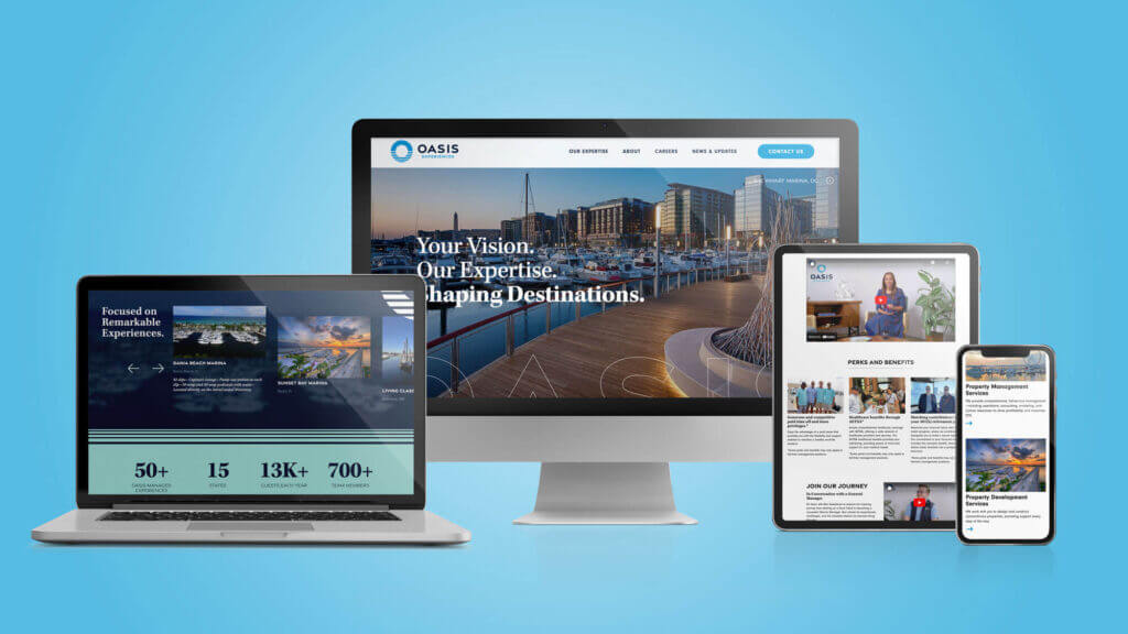 The Oasis Experiences website displayed on a series of screens, including a laptop, desktop monitor, tablet, and phone.