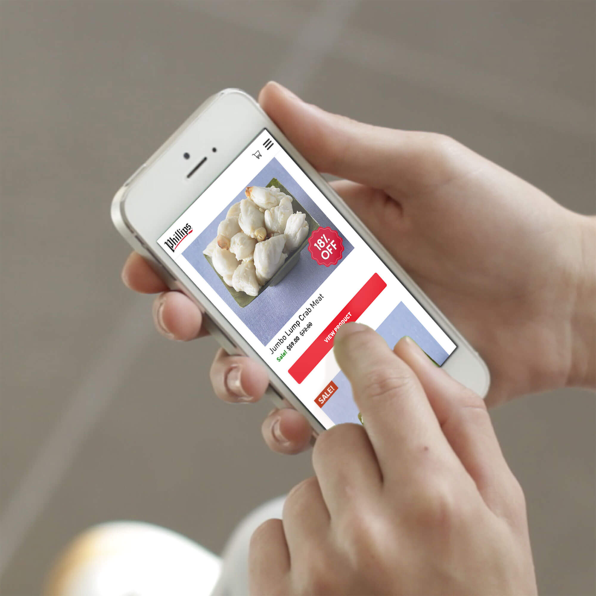 A phone screen displaying the Phillips Seafood website.