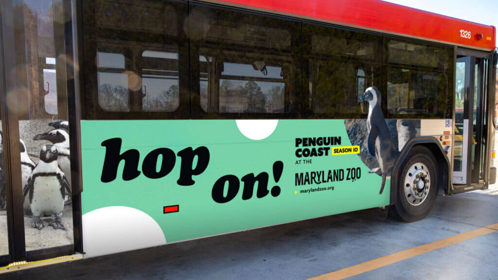 A bus advertisement reading, "hop on!"