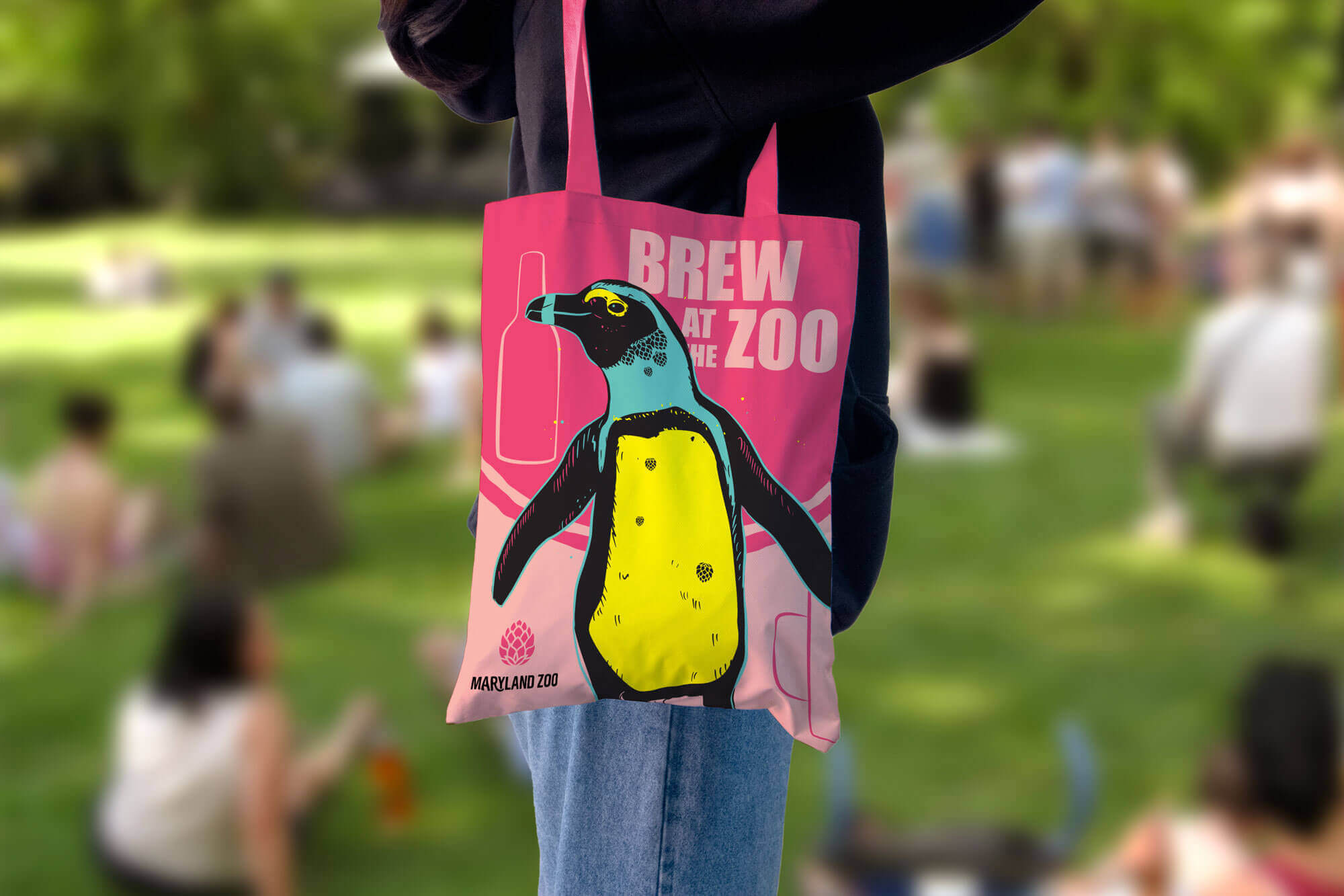 girl holding tote bag with custom penguin illustration and Brew branding